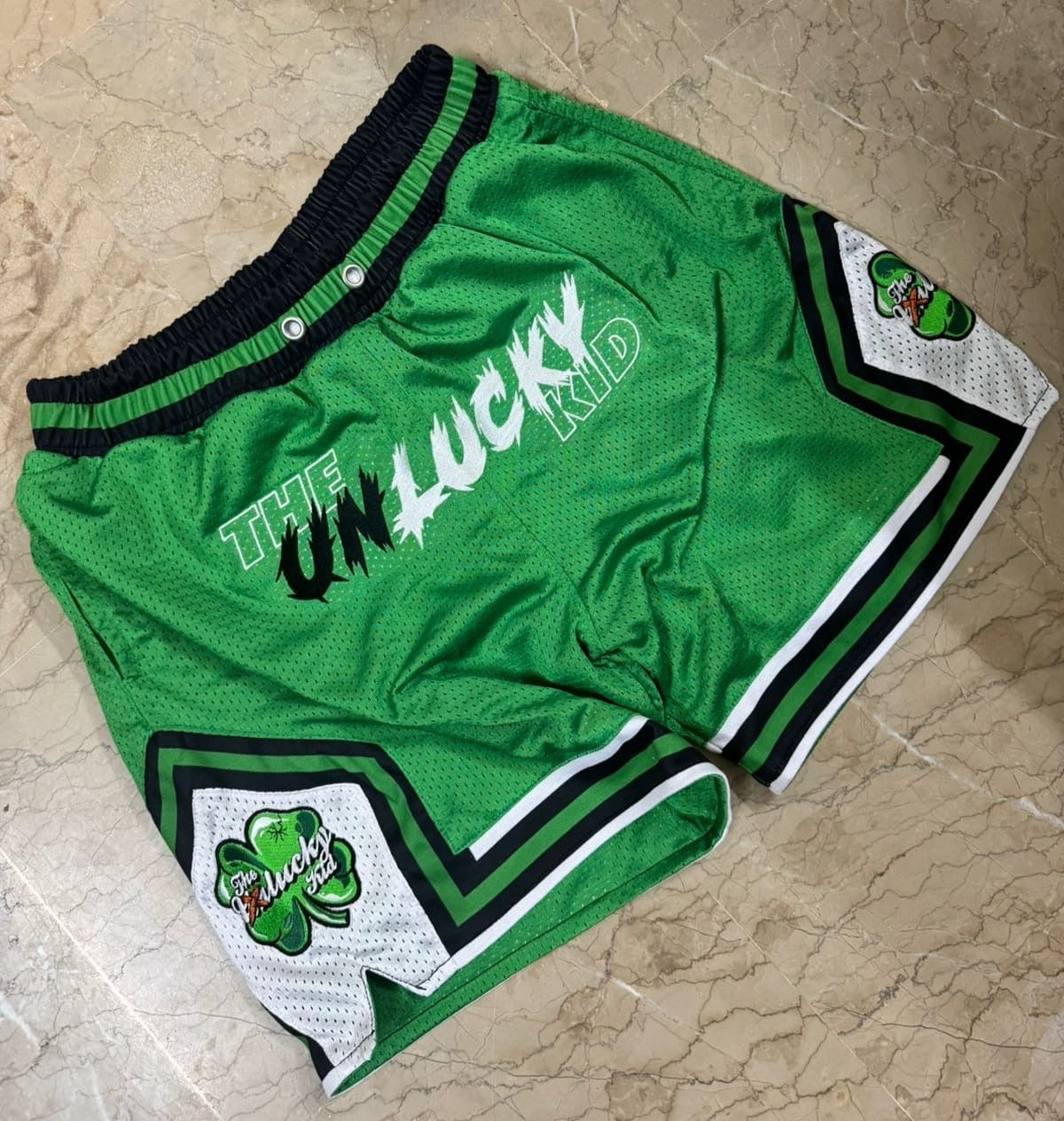 Celtics green mesh shorts